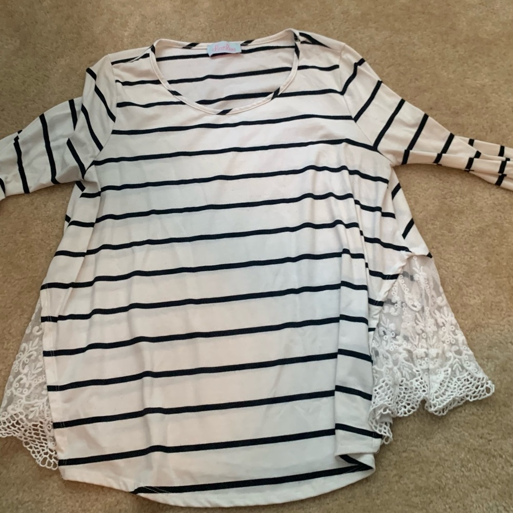 White top with black stripes